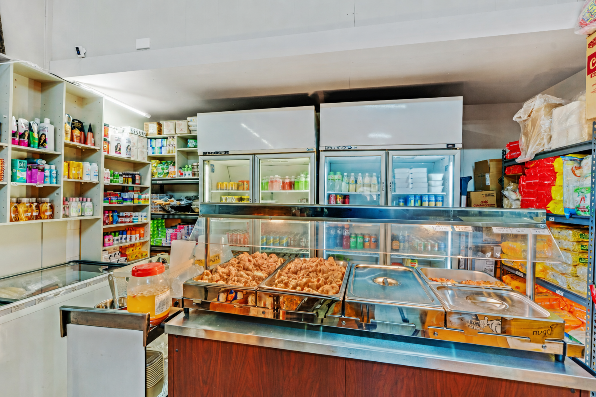 Prepared Filipino dishes displayed at Hernandez Asian Delights